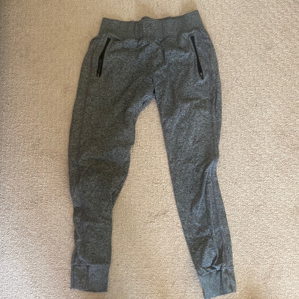 Dark grey Zella joggers with zip pockets. Size M